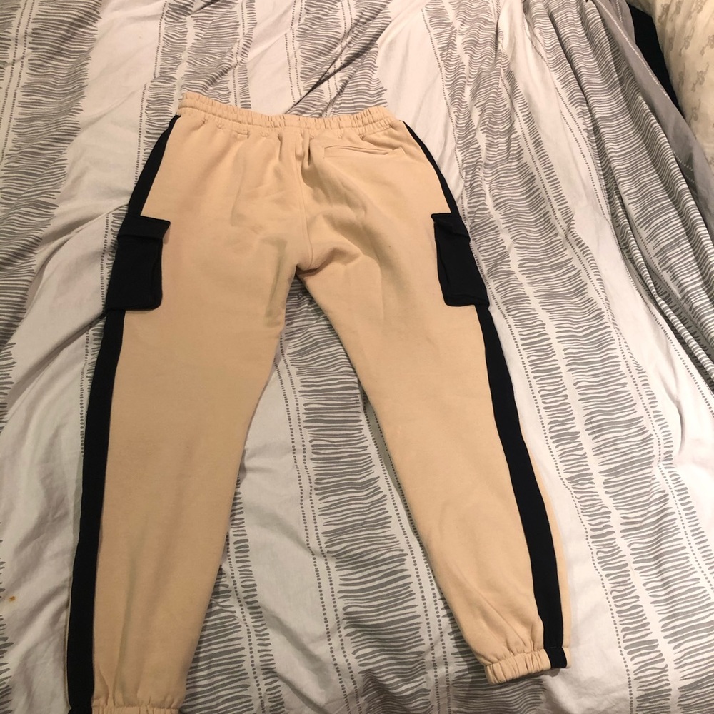 Pink Dolphin cream sweatpants